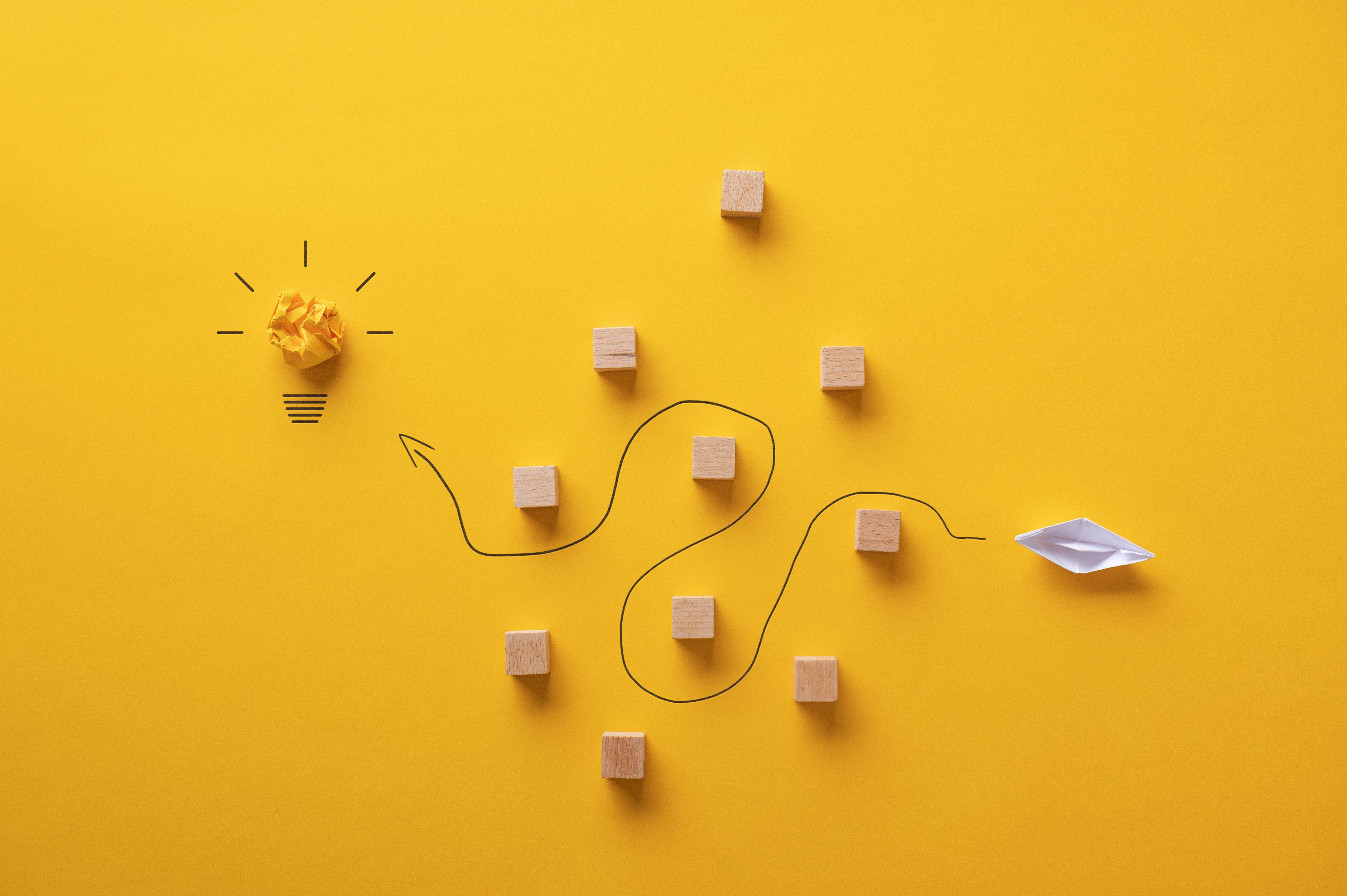 yellow background image with squares and a wiggly line going through it